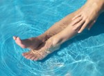 womans_feet_by_pool-r_200