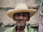 old_wrinkled_man_with_hat_and_cigar-r_200