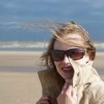 sad_woman_on_windy_beach-r_200