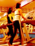 woman_on_electric_treadmill_at_gym-r_200