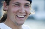 smile_white_teeth_guy_with_ponytail-r_200
